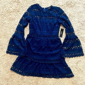 Navy bell sleeve mini. Never worn! Size S.